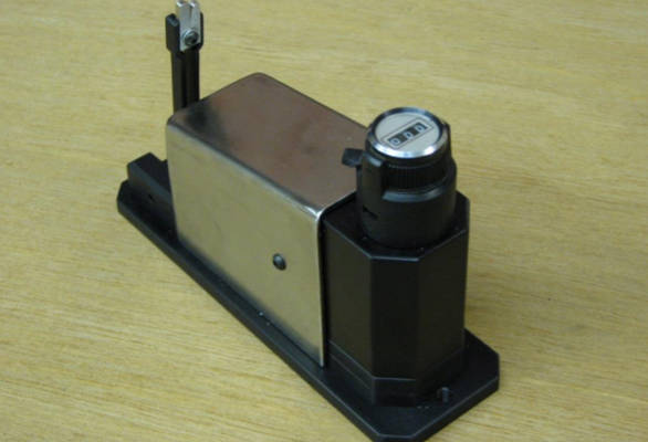 Non-destructive—zero-additional-inertia—needle-attachment-pull-tester